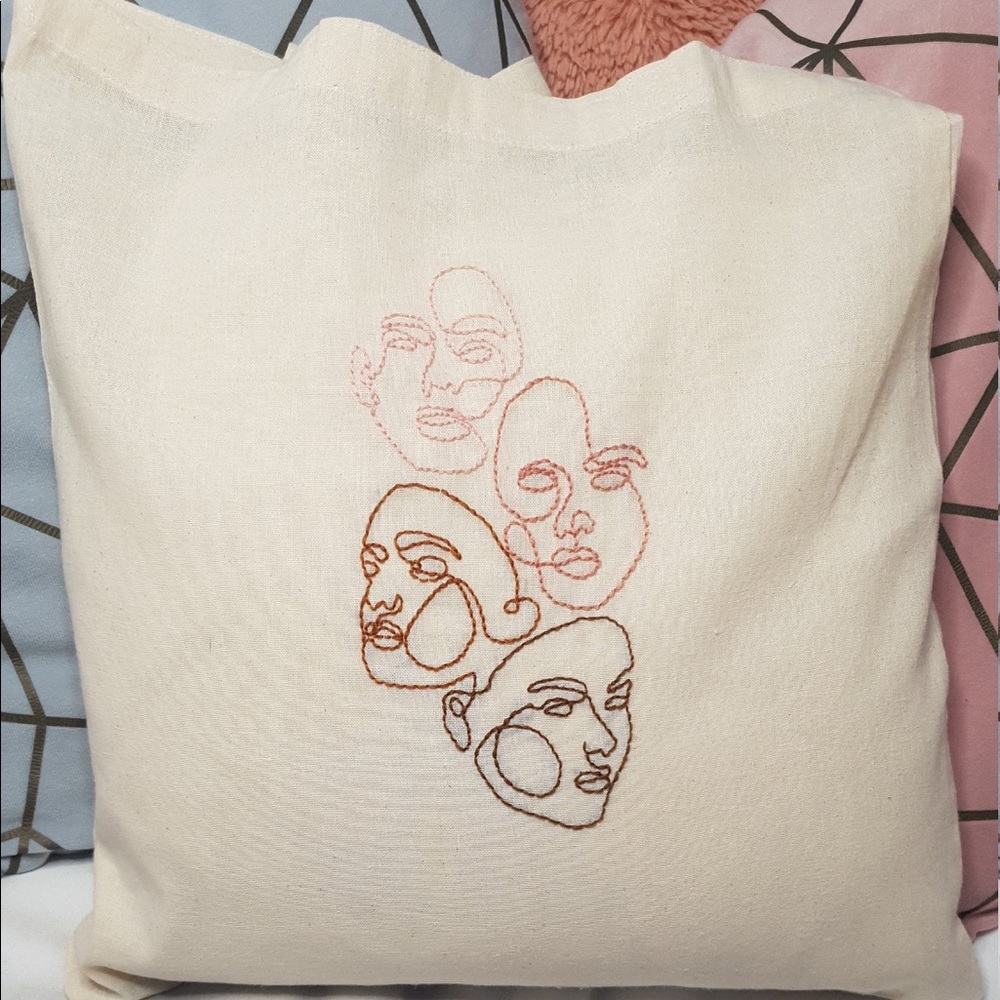 Embroidered Faces Tote Bag